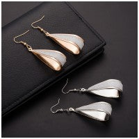 Load image into Gallery viewer, Hollow Water Drop Earrings - Secret Apparel
